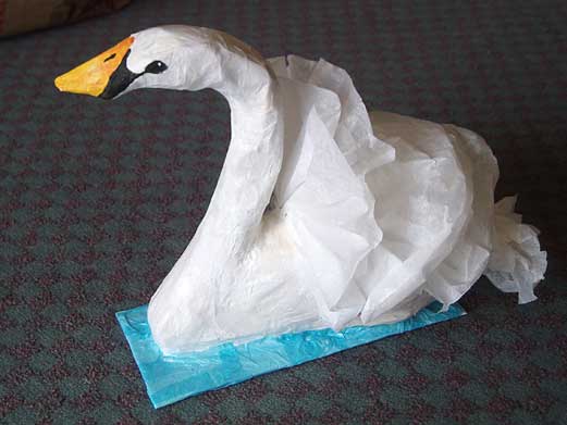 Swan made from newspaper and tissue paper