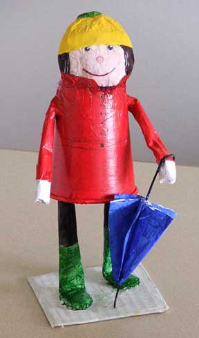 Girl with umbrella (made from a paper cup)